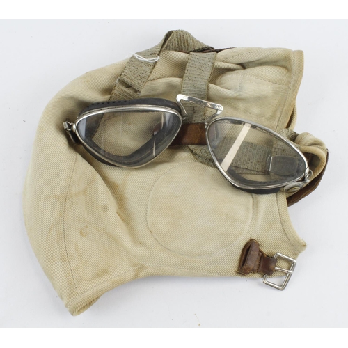 867 - Aviators flying helmet and goggles made by A O Spalding aviation clothing used by a female pilot in ... 