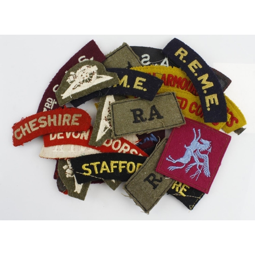 869 - Badge collection of various WW2 cloth shoulder titles, div patches etc.