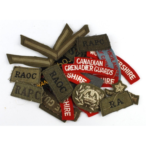 875 - Badges collection of mainly WW2 cloth shoulder titles.