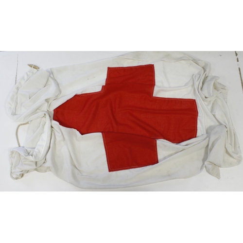 905 - British army red cross flag small broad arrow mark on spine.