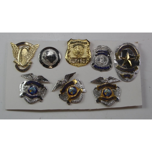 974 - California, Virginia, Texas, Florida & New York Police metal and enamel cap and breast badges.  (8 d... 