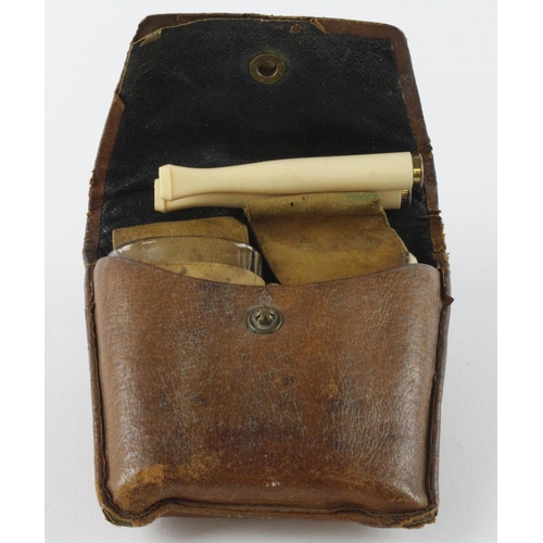 977 - Campaign cutlery set with bone handles, in leather pouch, possibly late Victorian