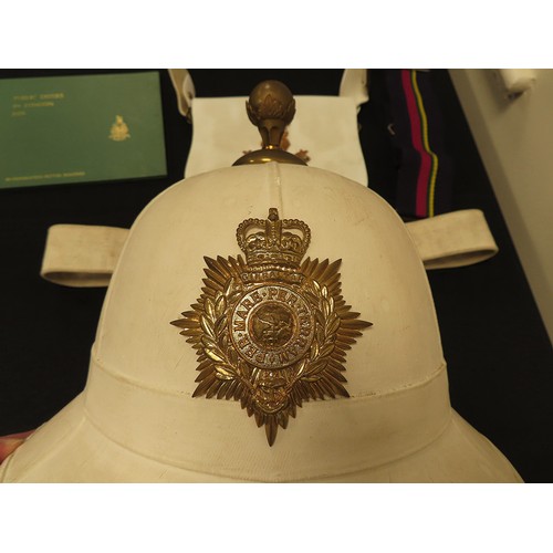 1542 - Royal Marines, ceremonial sun helmet with queens crown badge and brass fittings, buff leather musici... 