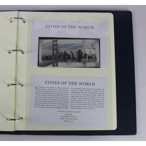 1 - An album of 'Cities of the World' silver notes minted from 5g of pure .999 silver, 10 notes each wit... 