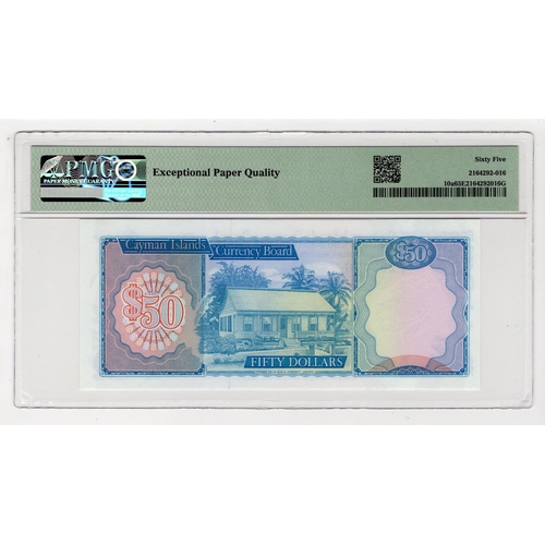 576 - Cayman Islands 50 Dollars dated 1974 (issued 1987), serial A/1 203776 (TBB B110a, Pick10a) in PMG ho... 