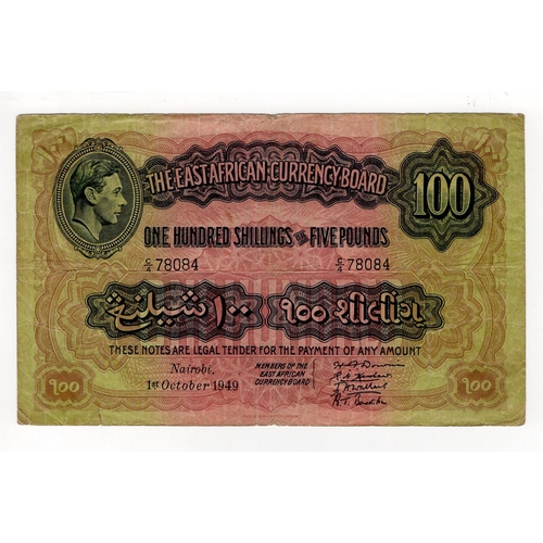 618 - East African Currency Board 100 Shillings or 5 Pounds dated 1st October 1949, portrait King George V... 