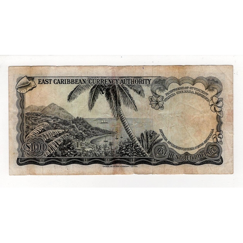 624 - East Caribbean 100 Dollars issued 1965, serial A1 292293 (TBB B104cv, Pick16n) edge nicks, some dirt... 