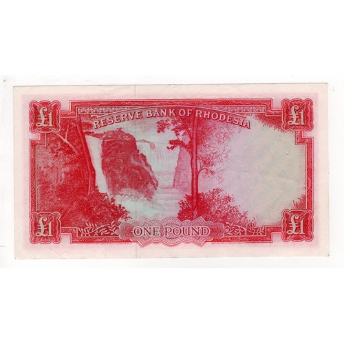 859 - Rhodesia 1 Pound dated 26th October 1964, serial G/10 090114 (TBB B102j, Pick25a) a few pinholes, ot... 