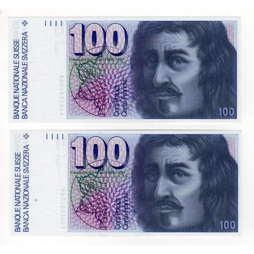 907 - Switzerland (2), 100 Franken (Francs) dated 1989, a consecutively numbered pair, serial 89U 1032953 ... 