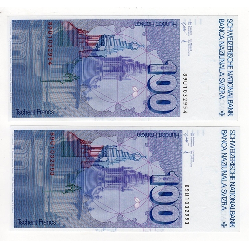 907 - Switzerland (2), 100 Franken (Francs) dated 1989, a consecutively numbered pair, serial 89U 1032953 ... 