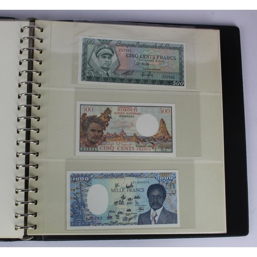 982 - World (62) in Lindner album, including East Caribbean 1 Dollar 1965, Belgium 1000 Francs 1980, Rwand... 