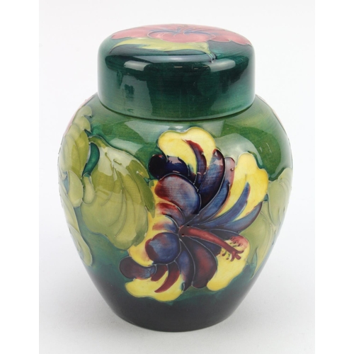 110 - Moorcroft green 'Hibiscus' pattern ginger jar, makers marks and paper labels to underside of both ja... 