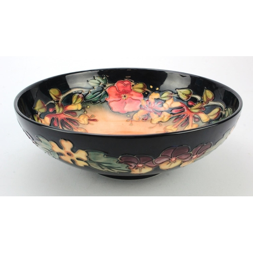 121 - Moorcroft. A large Moorcroft 'Oberon' pattern bowl, makers impressed marks and signed to base 'J. Mo... 