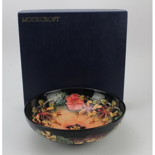 121 - Moorcroft. A large Moorcroft 'Oberon' pattern bowl, makers impressed marks and signed to base 'J. Mo... 