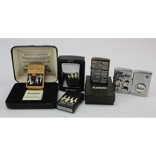 496 - Zippo Lighters. A collection of seven music related Zippo lighters, including Beatles, Rat Pack, Oas... 