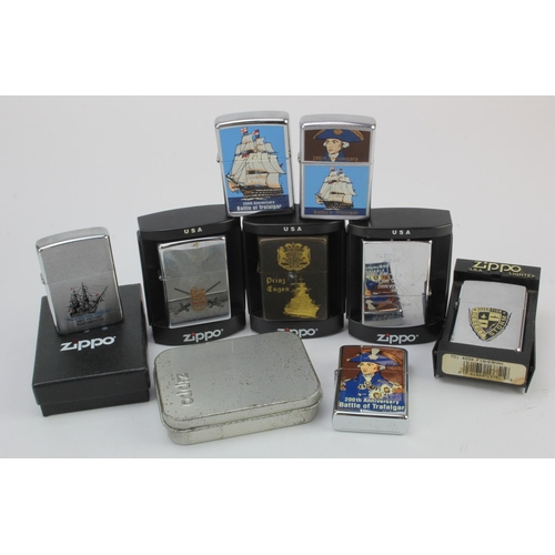 498 - Zippo Lighters. A collection of ten mostly Military & Naval related Zippo lighters, including Battle... 