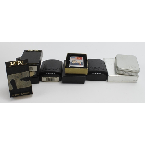 504 - Zippo Lighters. A collection of ten various Zippo lighters, including Merry Christmas, Gozo, Cristof... 