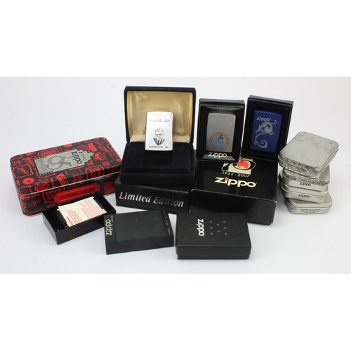 505 - Zippo Lighters. A collection of thirteen Zippo lighters, each relating to the Zippo company, all con... 