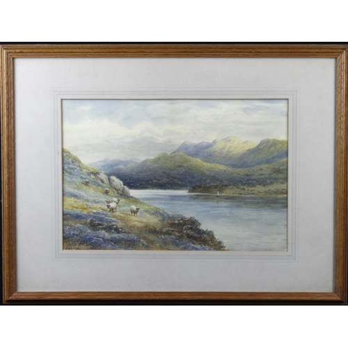 66 - Watercolour depicting a Welsh landscape with sheep to foreground, signed to lower left 'J. Lawest (?... 