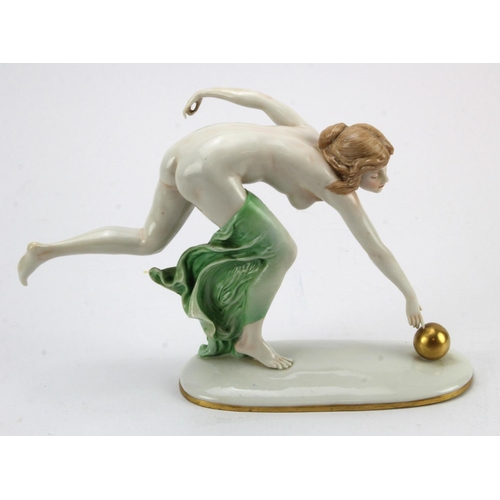 72 - Art Nouveau female nude figure reaching for a gold boule whilst her green towel falls, possibly desi... 