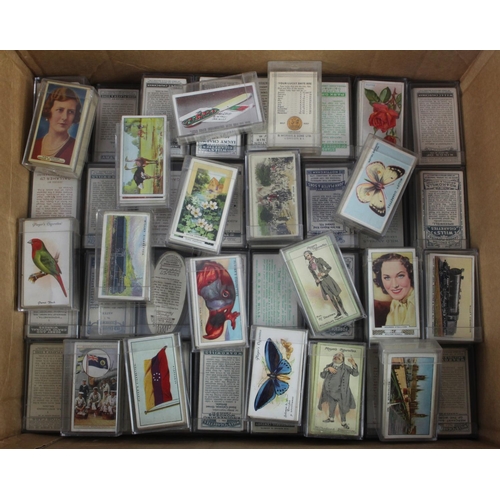 643 - Box with approx 80x full sets of cigarette cards (not checked) loose in small plastic cases.  G-VG