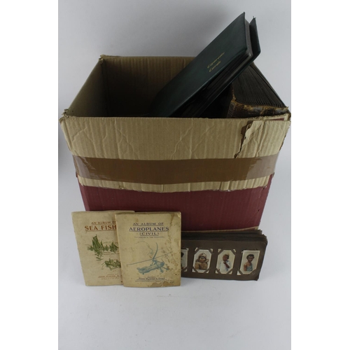 751 - Large box of Cigarette Cards, some Cigar Cards, etc in various old albums / binders, loose and stuck... 