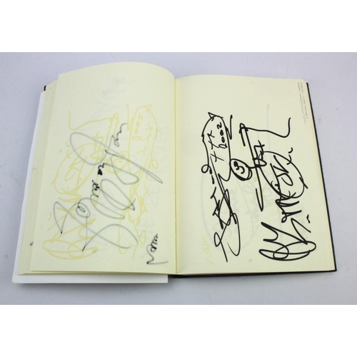 877 - Autograph Album. An autograph album containing over 100 signatures, circa 2001-2002, signers include... 