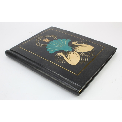 880 - Book Binding interest. A large custom made black morocco binding, decorated with swans and gilt deco... 