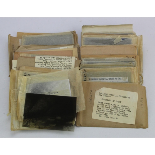 922 - 1930's-40's large format glass Press Negatives & photos, each with original typed notes. Many milita... 