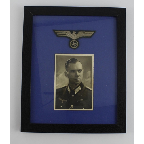 208 - German army officers photo with breast eagle above in frame.