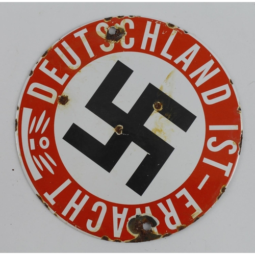 221 - German DETSCHLAND IST ERWACHT enamel plaque.