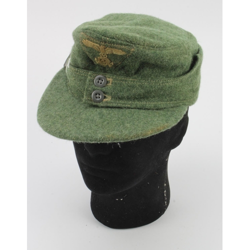 285 - German M43 style cap, SS Badged, service wear.