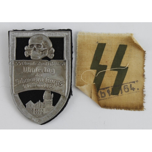 316 - German SS 1934 Wintertag Rally badge with SS cloth badge.