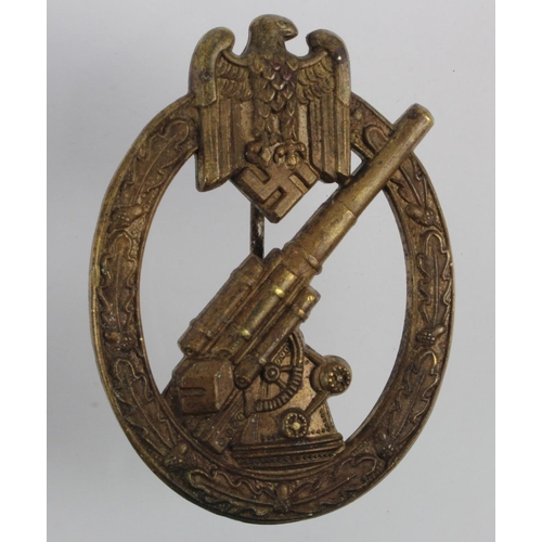 348 - German Wehrmacht Flak / 88mm Gunners badge in bronze.