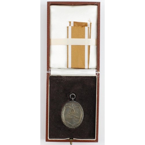 351 - German West Wall medal in private purchase fitted case.