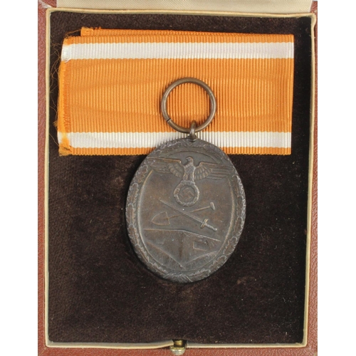 352 - German West Wall medal, in presentation case.