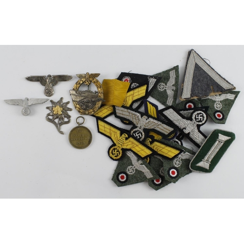 372 - German WW2 badges cloth and metal.