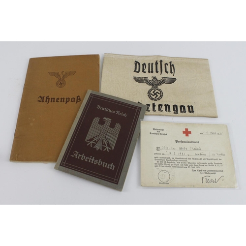 399 - German WW2 selection of documents, photos, arm band etc.