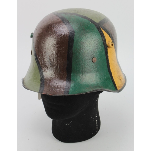 413 - M16 Helmet. Post war camo finish. Later liner and strap.