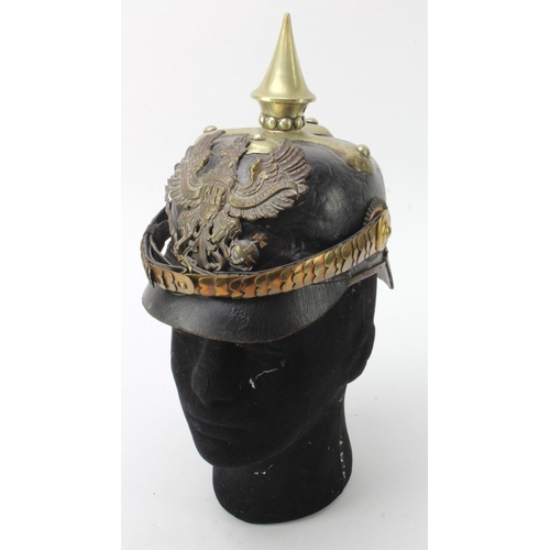 415 - Officers pickelhaube with Prussian plate. Reissued piece from Other Ranks leather shell. Contemporar... 