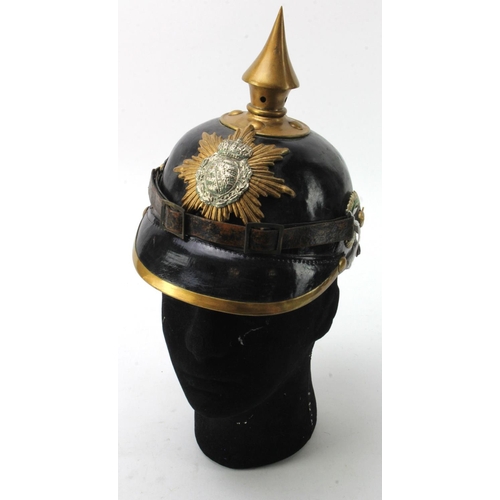 423 - Saxony Grenadier pickelhaube. Lacquer finish metalwork retouched. Liner and chord present. Spitz rep... 