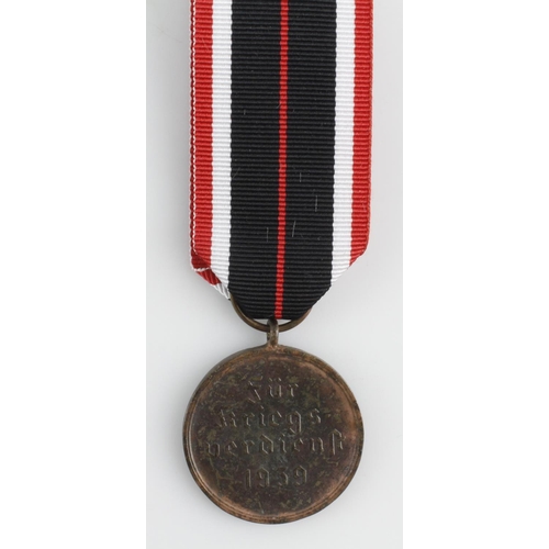 463 - WW2 German War Merit Medal (Kriegsaverdienstmedaille). A Military decoration awarded to civilians fo... 