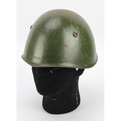 546 - Italian World War II Model 33 Helmet: Circa late 1930s, original paint, complete with original laced... 