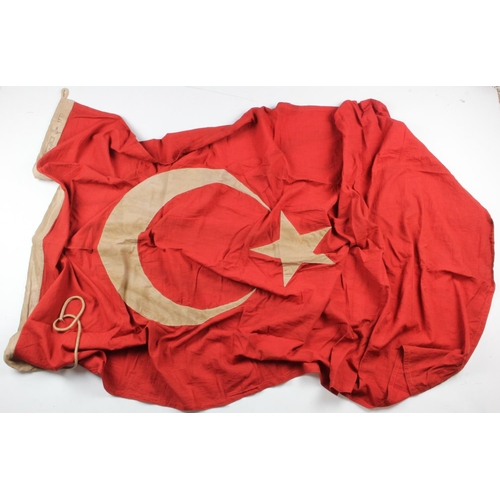 567 - Ottoman Turkish flag, 5 feet long, stamped to edge, 5 feet long, service stained.