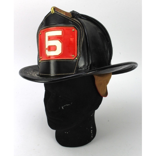 612 - US Firefighter Helmet with '5' badge to front. Made by Cairns & Brother Clifton New Jersey. Size 7, ... 