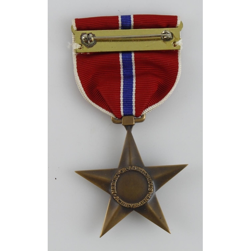 616 - US WW2 bronze star in packet of issue.