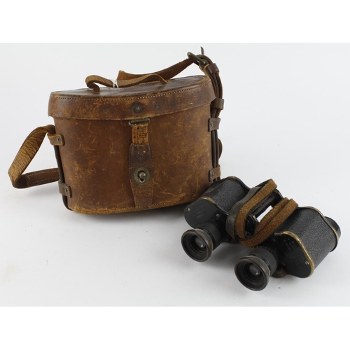 635 - WW1 1917 dated pair of binoculars in their 1916 dated leather case.