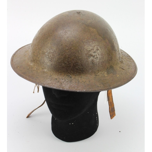 639 - WW1 British Brodie helmet complete with lining.