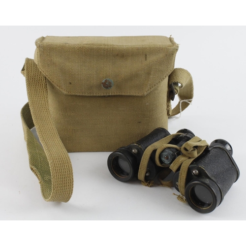 682 - WW2 1942 dated pair of Kershaw binoculars in their WW2 dated webbing case.