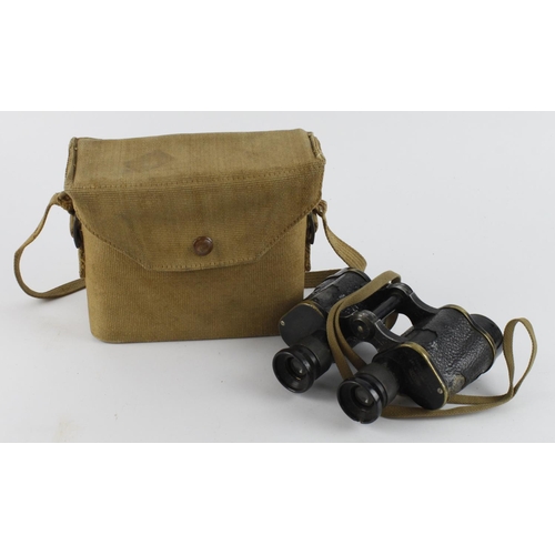 702 - WW2 pair of 1942 dated Kershaw army binoculars in their webbing case.